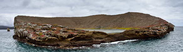 one of Bainbridge rocks with lagoon and flamingos, Galapagos